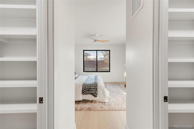 bedroom with light hardwood / wood-style floors