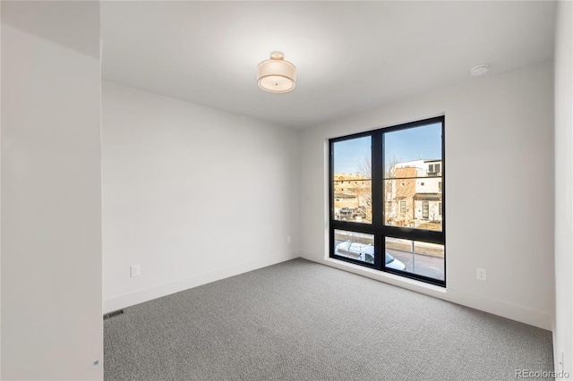 view of carpeted spare room