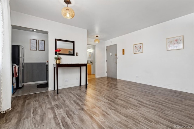 interior space with hardwood / wood-style flooring