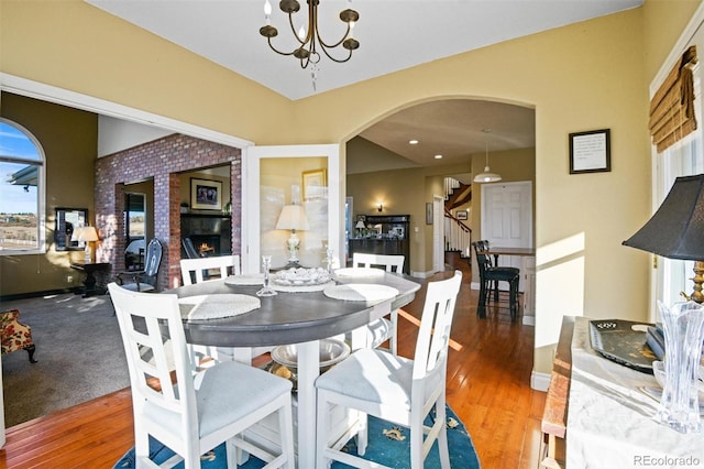 dining room with a chandelier and hardwood / wood-style floors