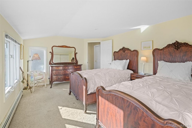 carpeted bedroom with lofted ceiling and baseboard heating