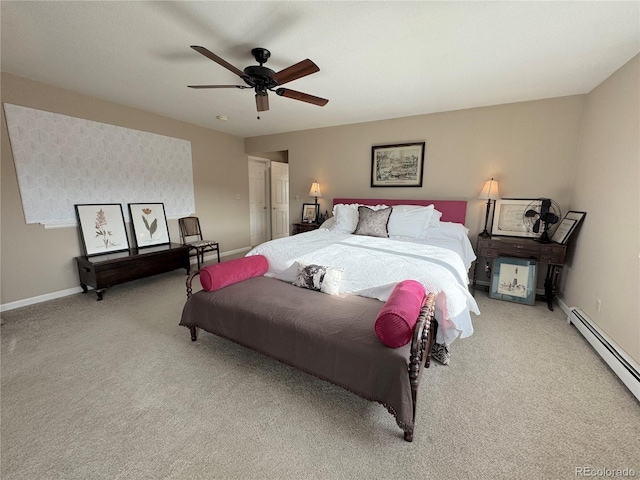595 W Oak Hill Ln, Castle Rock, CO 80108 - carpeted bedroom with a baseboard radiator, baseboards, and ceiling fan
