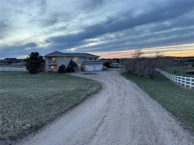 595 W Oak Hill Ln, Castle Rock, CO 80108 - view of front facade with driveway and an attached garage