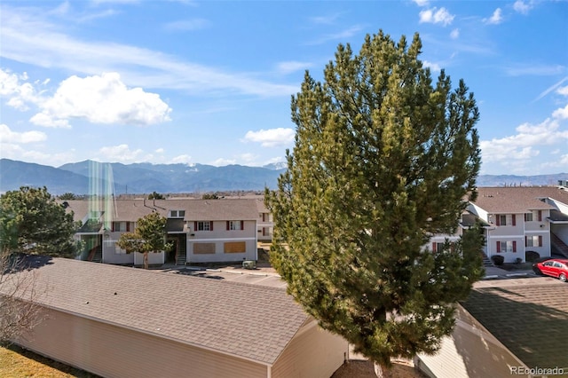 property view of mountains featuring a residential view