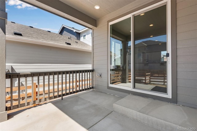 view of patio with a balcony