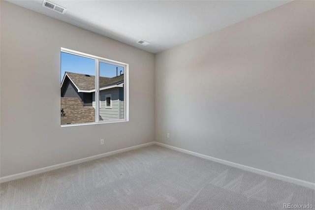 view of carpeted spare room