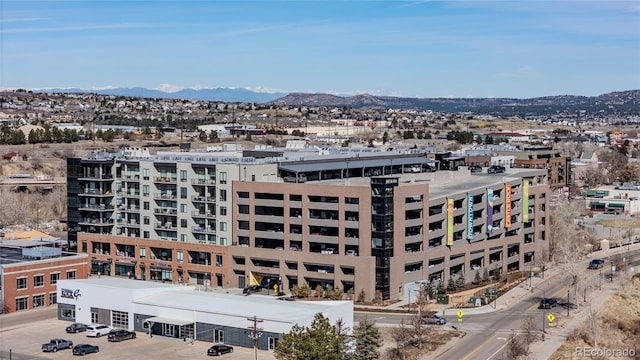 property's view of city featuring a mountain view