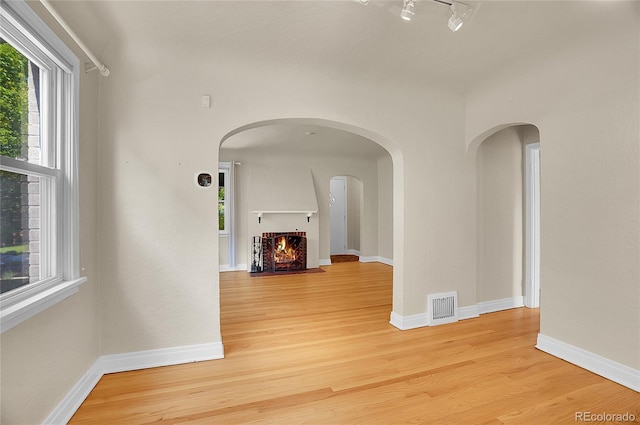 1208 S Elizabeth St, Denver, CO 80210 - hall with light wood finished floors and baseboards