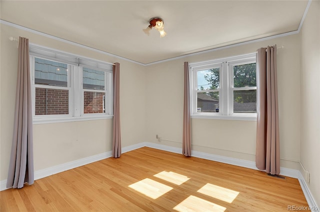 1208 S Elizabeth St, Denver, CO 80210 - unfurnished room with light wood-type flooring and baseboards