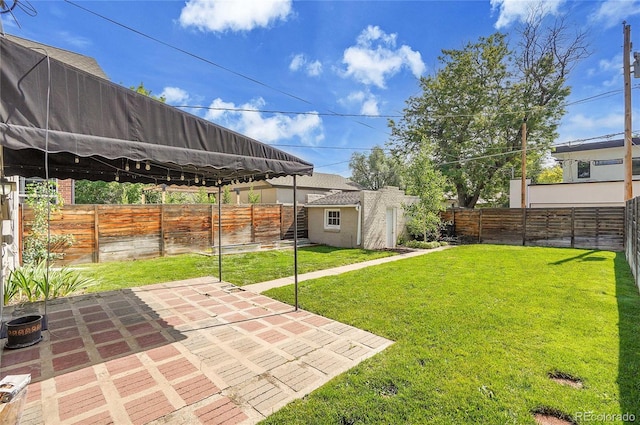 1208 S Elizabeth St, Denver, CO 80210 - view of yard with a patio and an outdoor structure