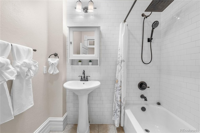 328 E Dakota Ave, Denver, CO 80209 - full bath with shower / tub combo with curtain, a sink, and tile patterned flooring