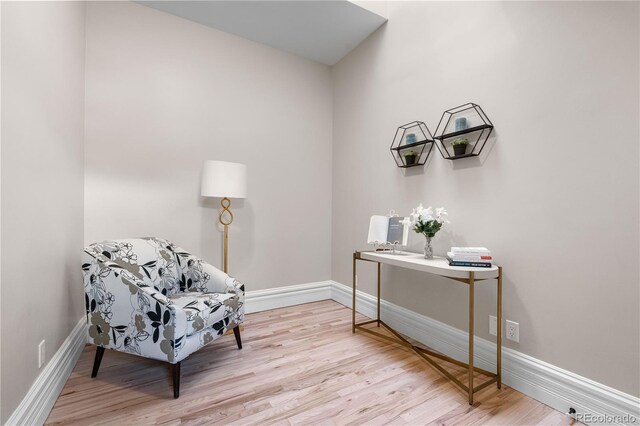 328 E Dakota Ave, Denver, CO 80209 - living area with light wood-type flooring and baseboards