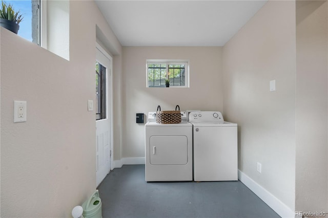 328 E Dakota Ave, Denver, CO 80209 - laundry room with washer and clothes dryer and baseboards