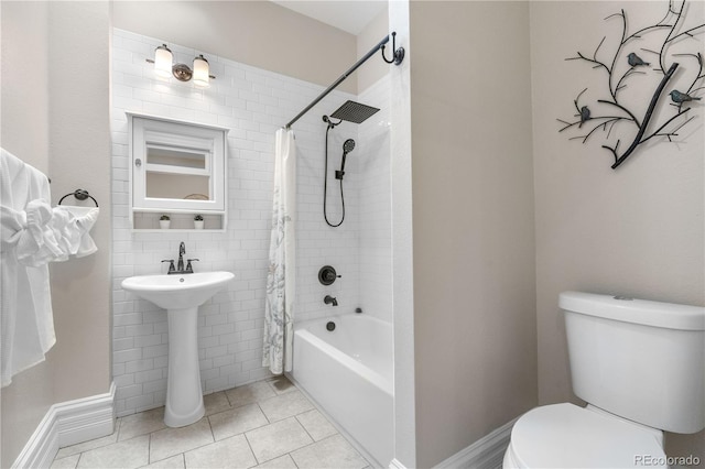 328 E Dakota Ave, Denver, CO 80209 - full bath featuring shower / bath combo with shower curtain and tile patterned flooring