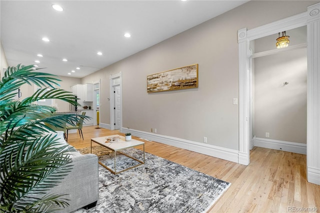 328 E Dakota Ave, Denver, CO 80209 - living area featuring light wood-style flooring and recessed lighting
