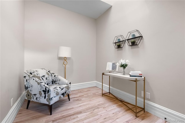 328 E Dakota Ave, Denver, CO 80209 - living area with light wood-type flooring and baseboards