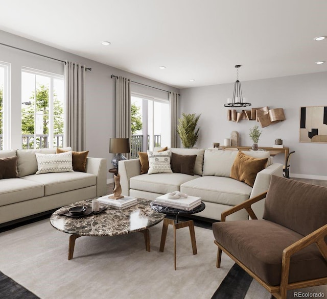 living room with a notable chandelier and recessed lighting