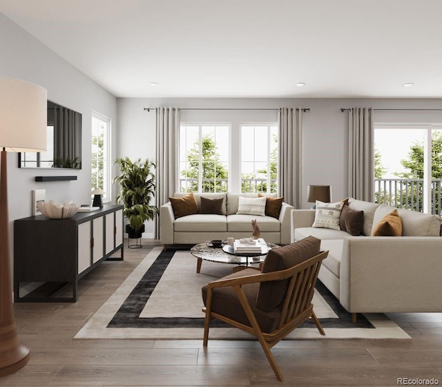 living room with recessed lighting and wood finished floors