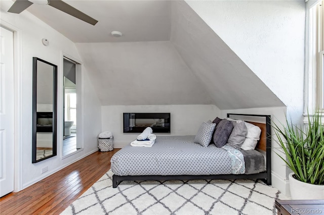 2358 N Ogden St Unit B, Denver, CO 80205 - bedroom featuring hardwood / wood-style floors and lofted ceiling