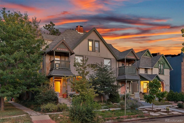 2358 N Ogden St Unit B, Denver, CO 80205 - victorian home featuring a balcony and a chimney