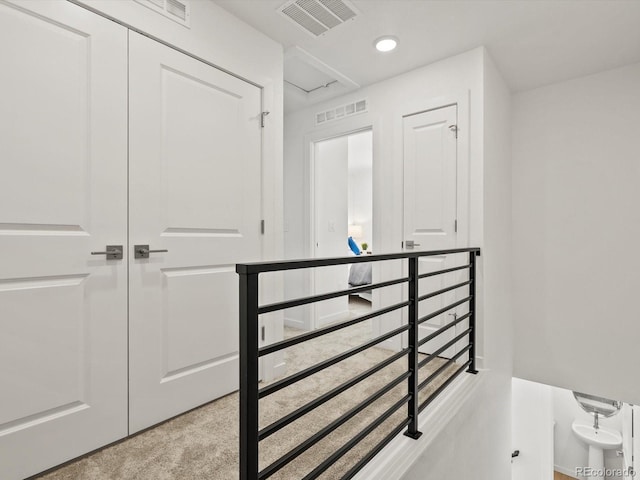2050 S Holly St Unit 1, Denver, CO 80222 - hall featuring an upstairs landing