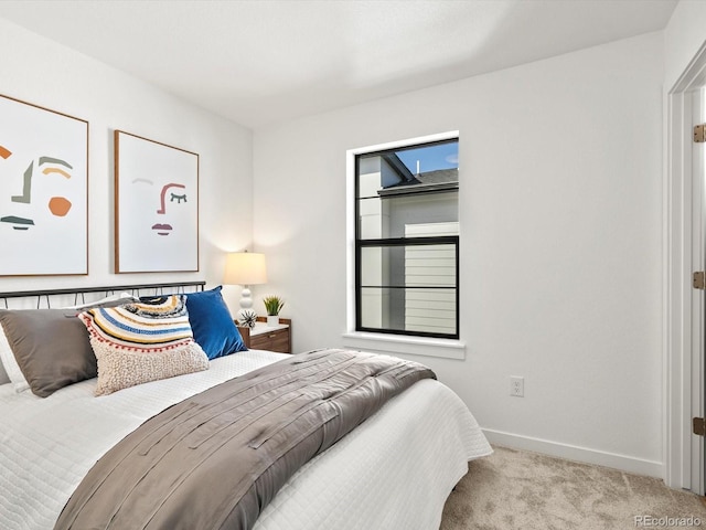 2050 S Holly St Unit 1, Denver, CO 80222 - carpeted bedroom featuring baseboards