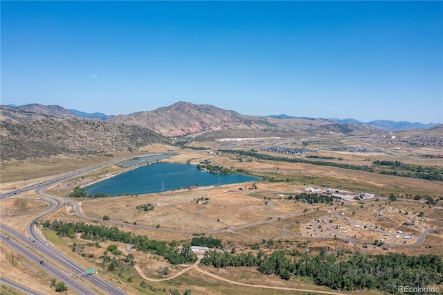 bird's eye view featuring a water and mountain view