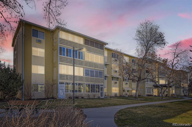 view of property at dusk