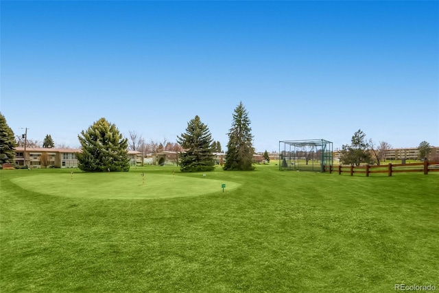 720 S Clinton St Unit 2D, Denver, CO 80247 - exterior space with golf course view and fence