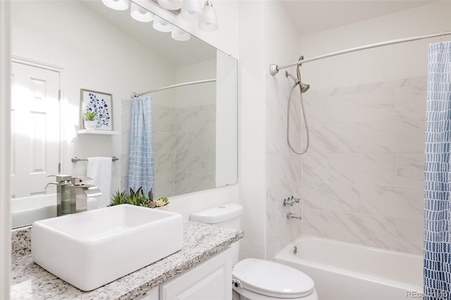3026 W Prentice Ave Unit H, Littleton, CO 80123 - bathroom featuring shower / bath combo with shower curtain, vanity, and toilet