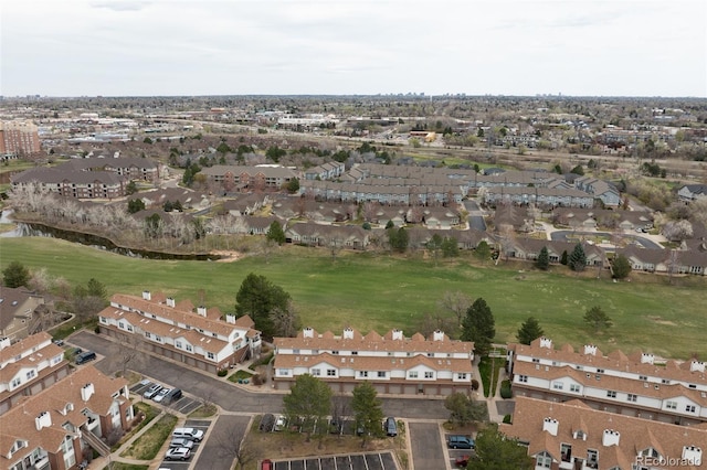 3026 W Prentice Ave Unit H, Littleton, CO 80123 - aerial overview of property's location featuring a local golf course and nearby suburban area