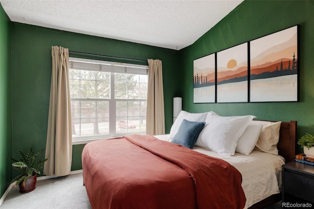 3026 W Prentice Ave Unit H, Littleton, CO 80123 - bedroom featuring carpet and a textured ceiling