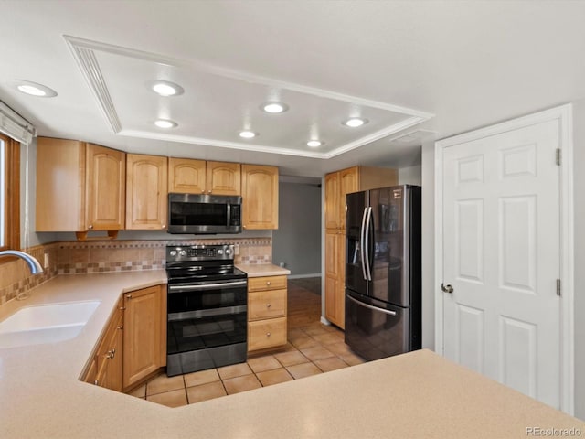 5903 S Ward St, Littleton, CO 80127 - kitchen featuring stainless steel microwave, black electric range, refrigerator with ice dispenser, a raised ceiling, and recessed lighting