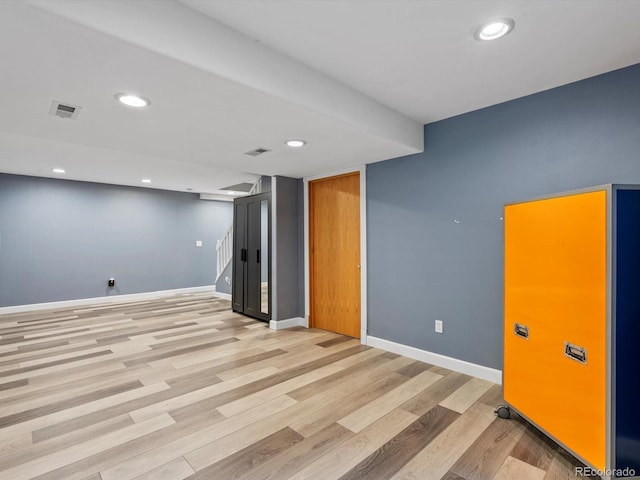 5903 S Ward St, Littleton, CO 80127 - finished basement with light wood-style flooring and recessed lighting