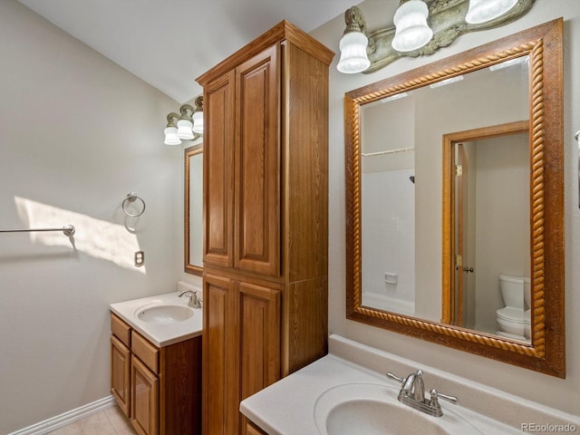 5903 S Ward St, Littleton, CO 80127 - bathroom featuring vanity, vaulted ceiling, and a shower