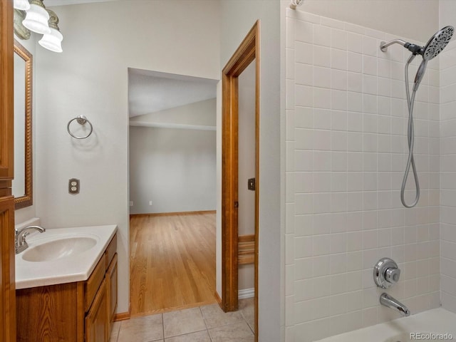 5903 S Ward St, Littleton, CO 80127 - bathroom featuring bathtub / shower combination, vanity, and tile patterned flooring