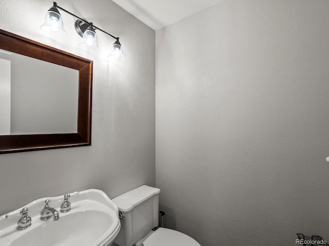 5903 S Ward St, Littleton, CO 80127 - bathroom with a sink and toilet