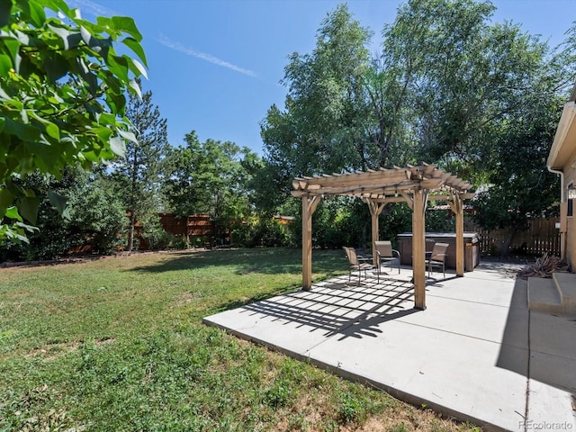 5903 S Ward St, Littleton, CO 80127 - fenced backyard with a hot tub, a patio area, and a pergola