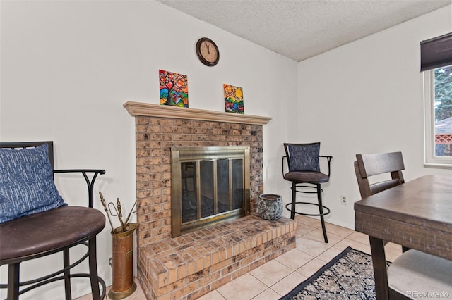 interior space featuring a fireplace and a textured ceiling