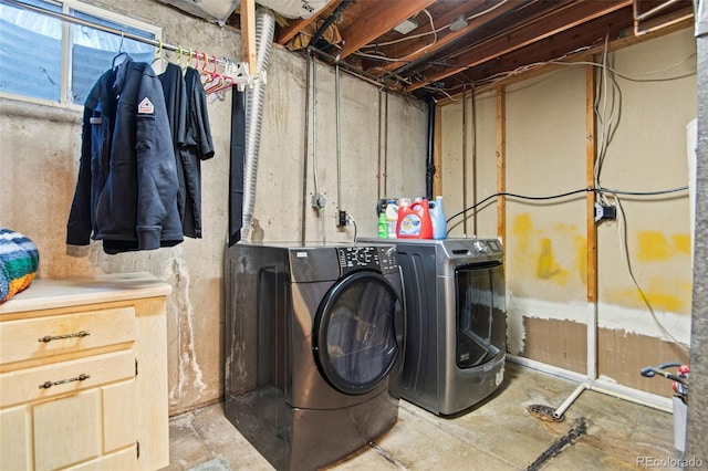 laundry area featuring washing machine and dryer