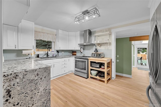 6015 S Milwaukee Way, Centennial, CO 80121 - kitchen featuring wall chimney exhaust hood, stainless steel appliances, crown molding, open shelves, and white cabinets