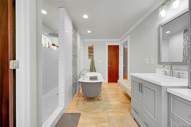 6015 S Milwaukee Way, Centennial, CO 80121 - full bathroom with a walk in shower, vanity, crown molding, a freestanding bath, and wood finished floors