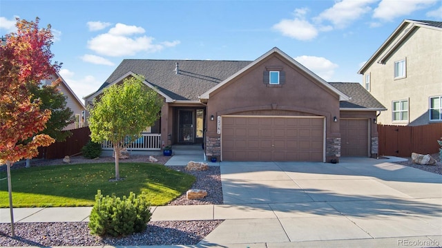 view of front of house with a front lawn and a garage