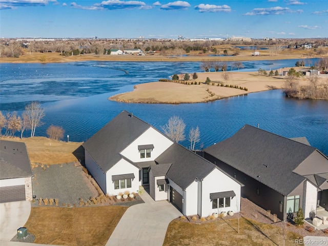 bird's eye view with a water view