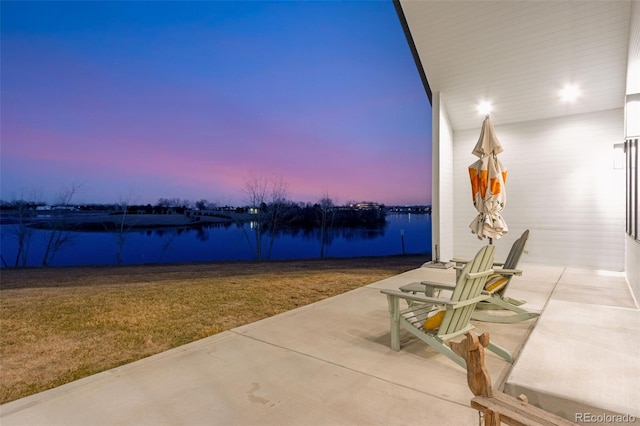 view of patio featuring a water view