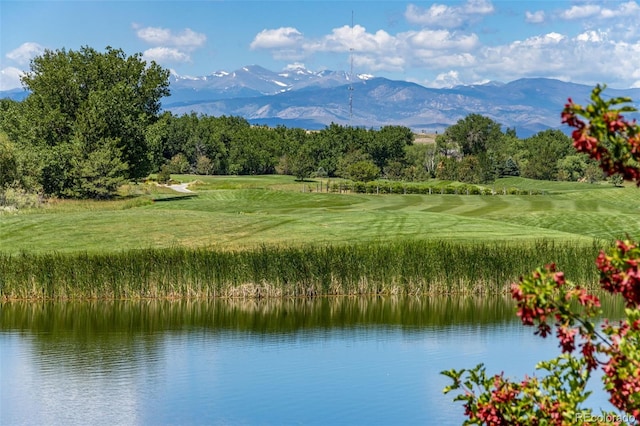 view of water feature with golf course view and a mountain view