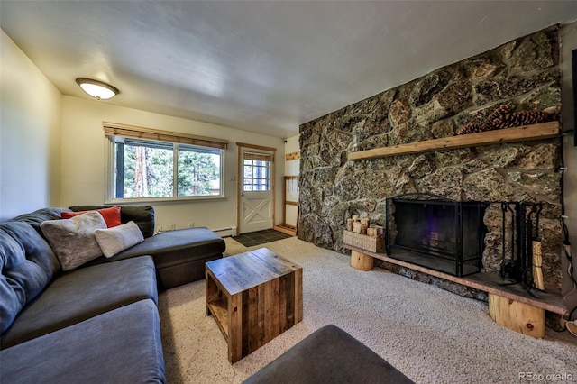 446 Hi Country Drive 17 & 18, Winter Park, CO 80482 - carpeted living area with baseboard heating and a stone fireplace