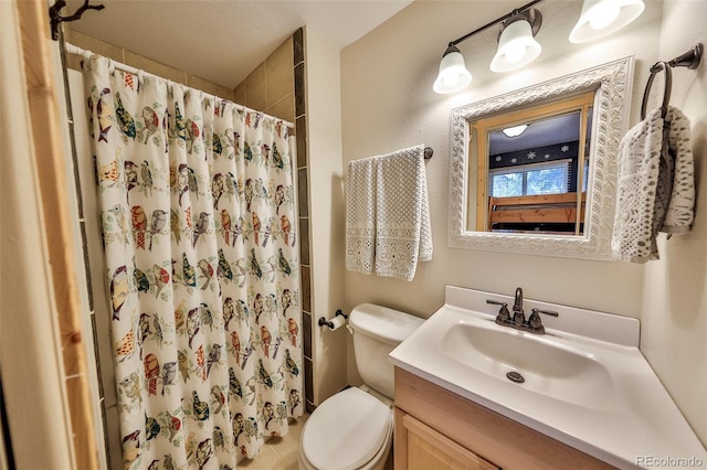 446 Hi Country Drive 17 & 18, Winter Park, CO 80482 - full bathroom featuring toilet, vanity, and a shower with curtain