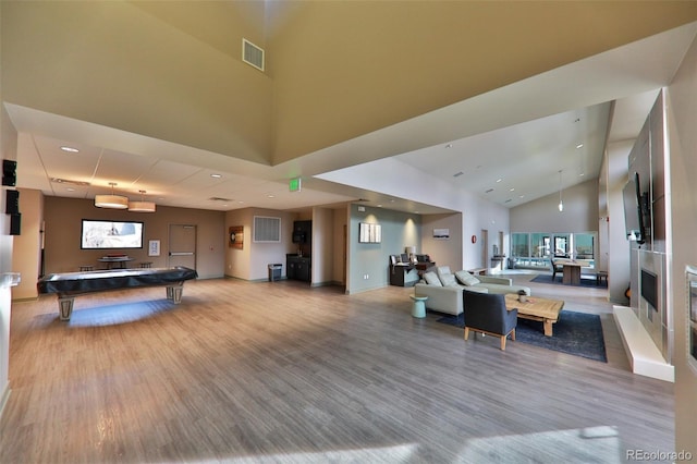 446 Hi Country Drive 17 & 18, Winter Park, CO 80482 - living room featuring wood finished floors, high vaulted ceiling, billiards table, baseboards, and recessed lighting