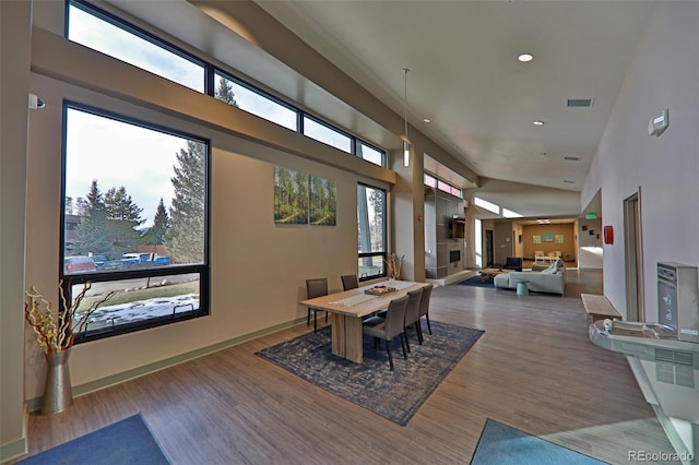 446 Hi Country Drive 17 & 18, Winter Park, CO 80482 - dining room with a towering ceiling, wood finished floors, and recessed lighting